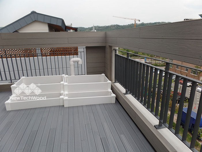 composite decks and safety fencing on roof top kids playground